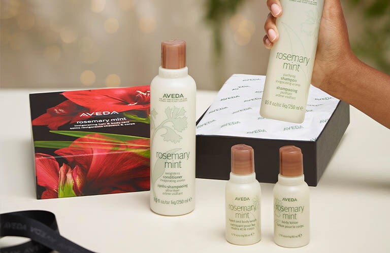 Product image of the limited-edition Rosemary Mint Invigorating Hair and Body Care set.