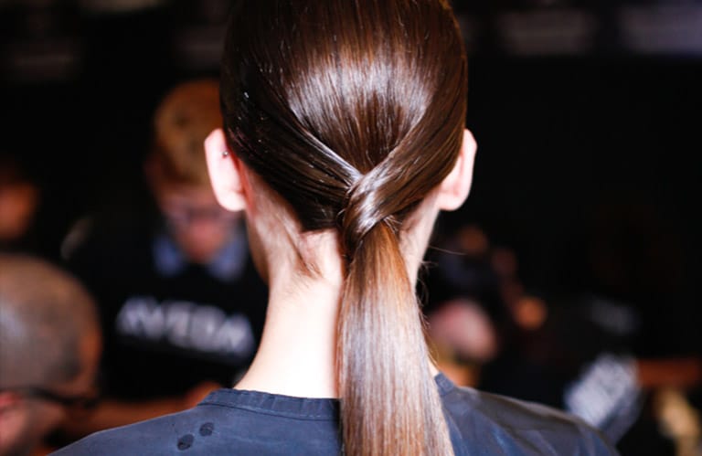 Model wearing a gemstone ponytail.